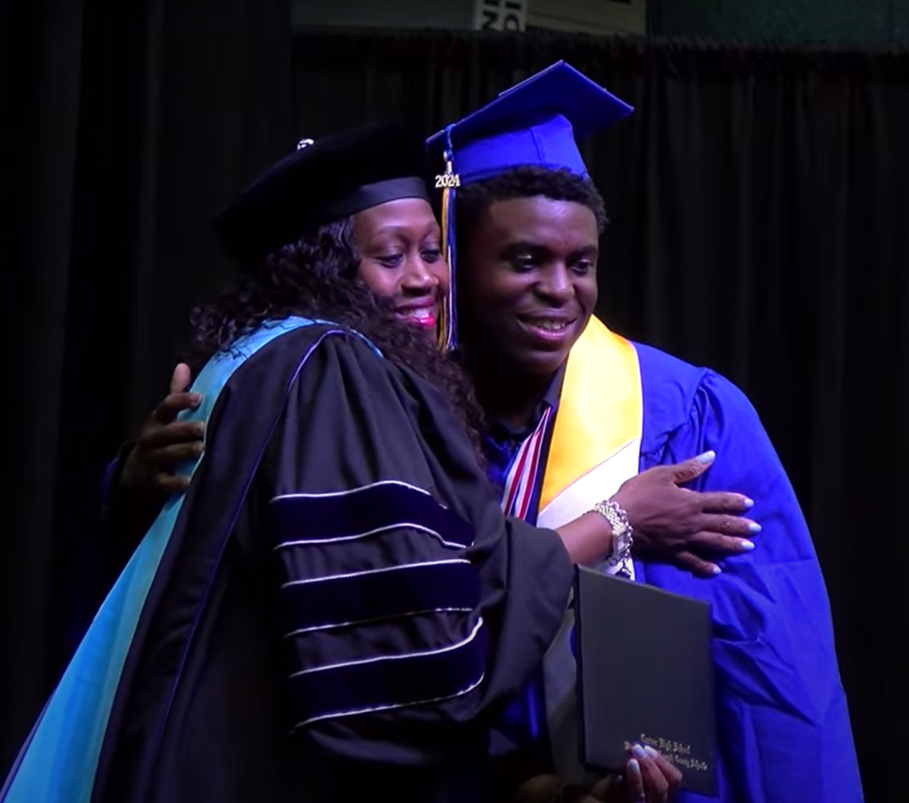 Carver HS Graduation - principal with student