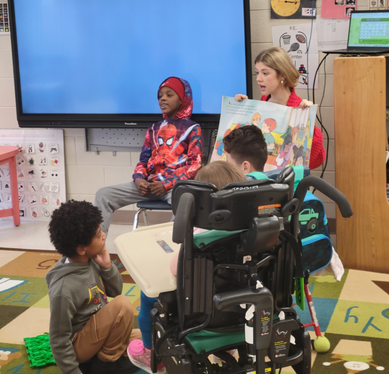 volunteer reading to class