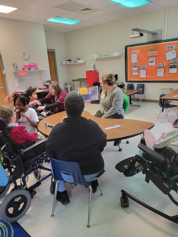 volunteer reading to class