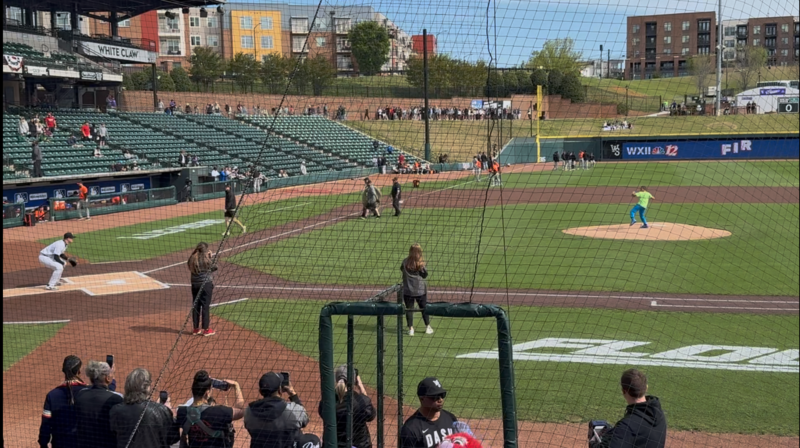 Kayden C. throws first pitch at Dash game