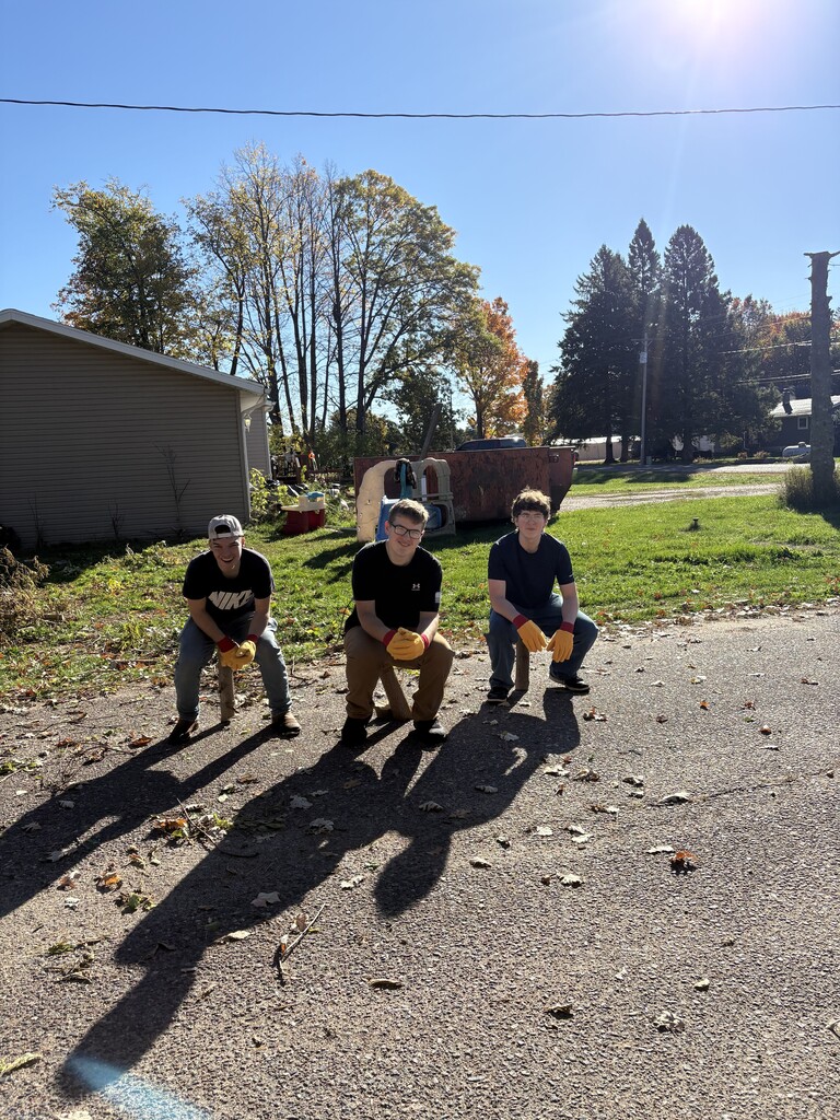 HS Students help with village brush piles.