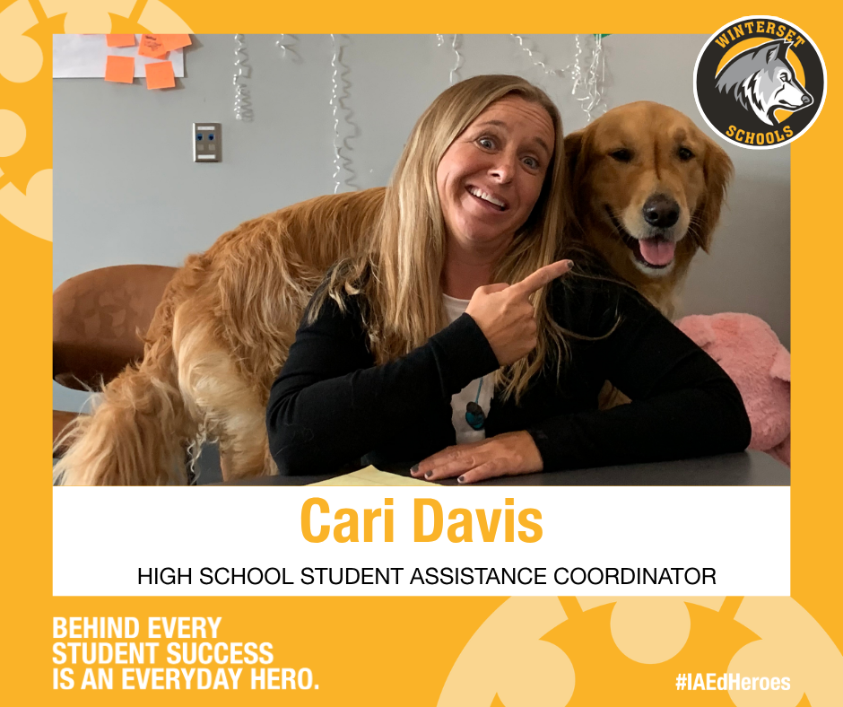 A smiling woman pointing at a golden retriever. Text reads "Cari Davis, High School Student Assistance Coordinator" with a background of the school's logo.