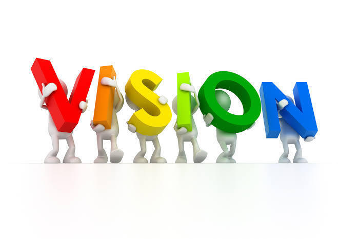 Small people like figures holding the word vision. The V is red, I is orange, S is yellow, I is lime green, O is green and N is blue.