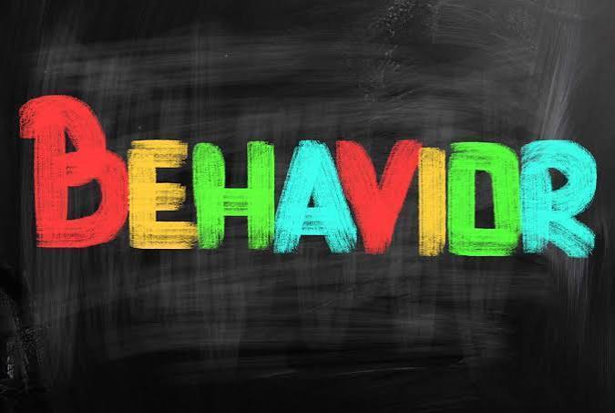 Black/Grey background. the word Behavior is multi colored.