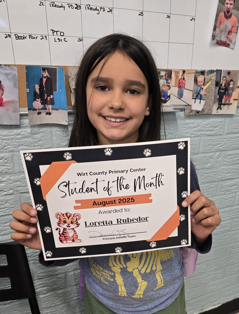 Student of the Month recipient with certificate Loretta R