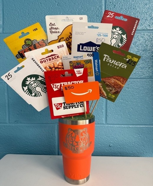 Photo of Yeti cup full of gift cards