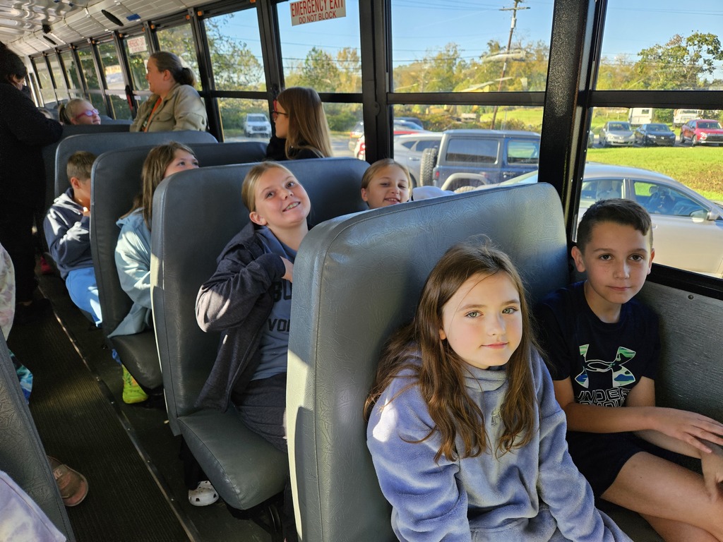 Photo of students on a school bus