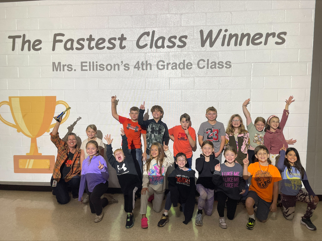 image of Mrs. Ellison's class holding the Fastest Class trophy