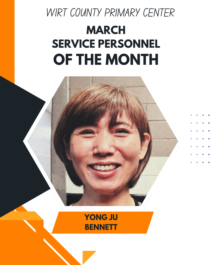 A recognition graphic from Wirt County Primary Center with the text “March Service Personnel of the Month.” A centered portrait photo shows Yong Ju Bennett. The name “Yong Ju Bennett” appears in text below the photo, displayed within a clean, orange‑and‑black design layout.