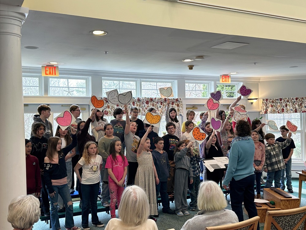 Students singing at Nursing home