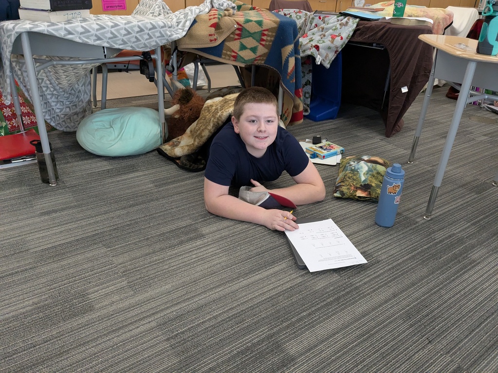 Student in fort in classroom