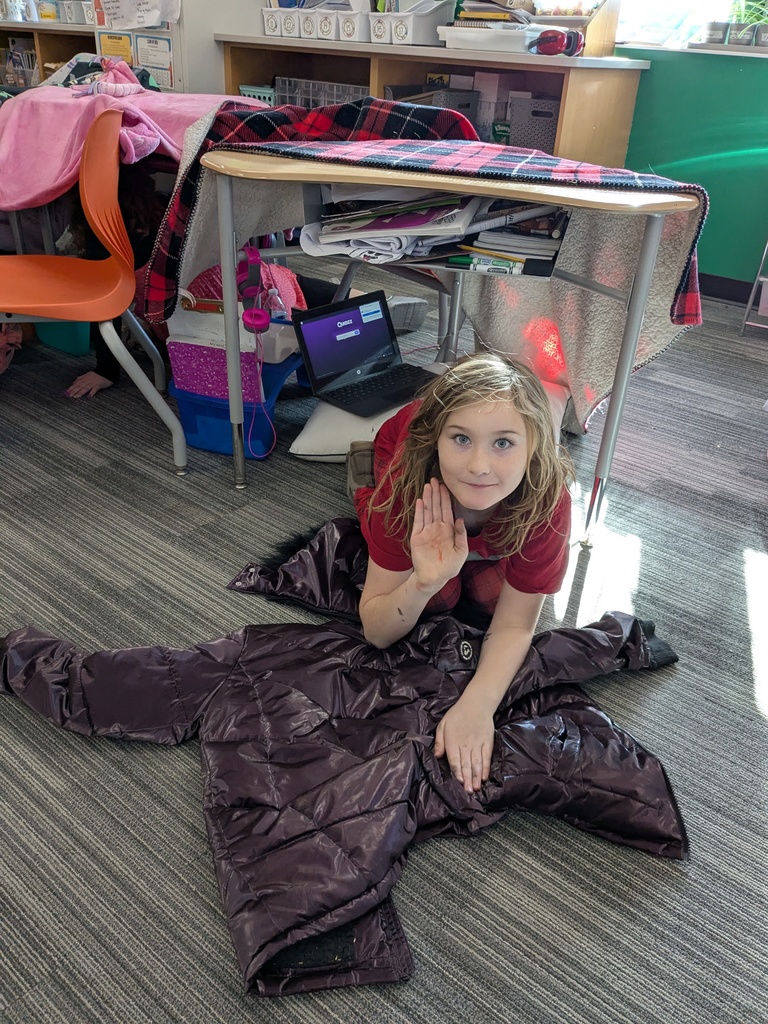 Student in fort in classroom