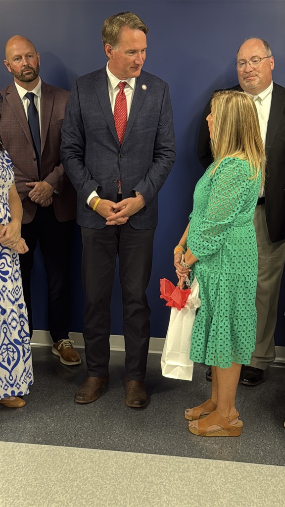 Governor Glenn Youngkin speaks to Mary Beth Masters