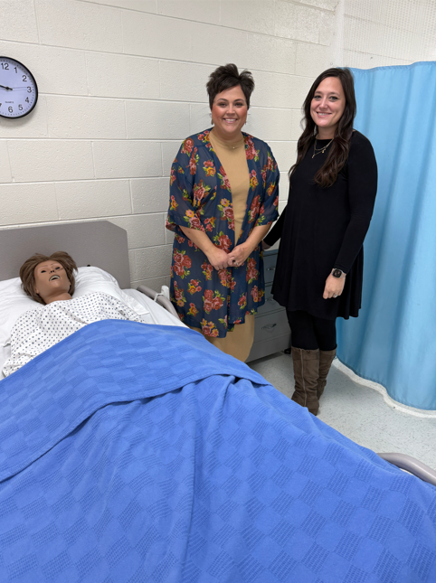 Nursing instructors pose for a picture 