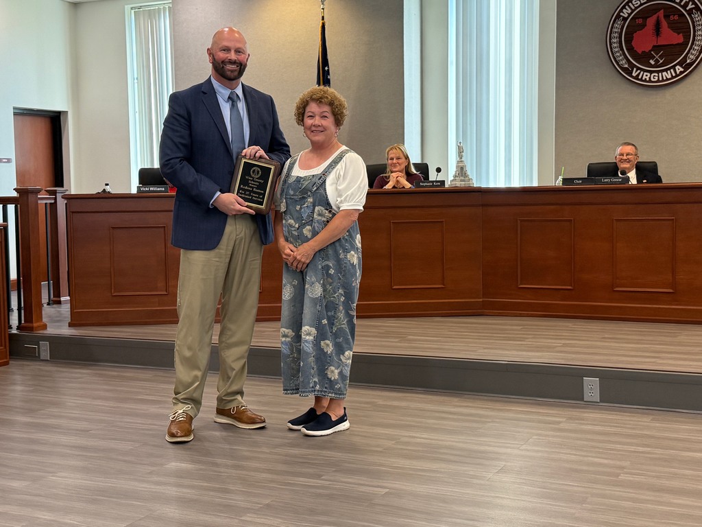 Dr. Mike Goforth presents a retirement plaque to Mrs. Redena Barton | 37 Years of Service