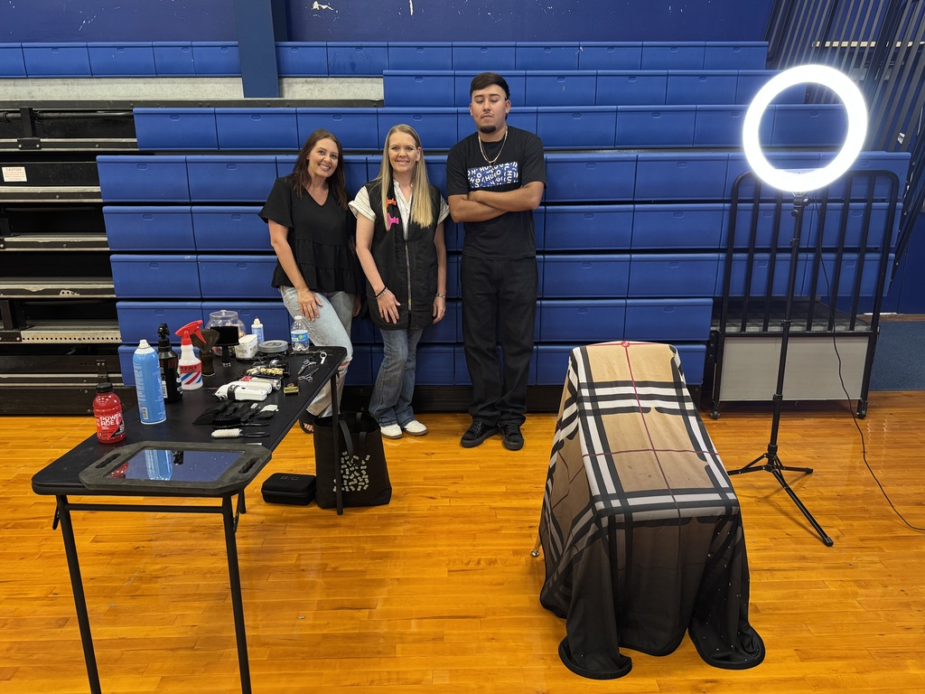 Stephanie Bongratz, Melissa Foster, Roger Leyva provided free hair cuts for students.
