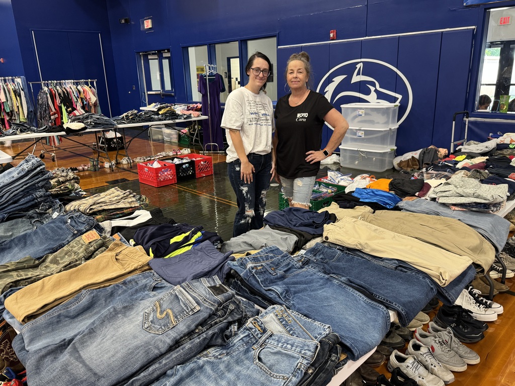 Cara Bull and Jessica Williams assisted families with free clothing.