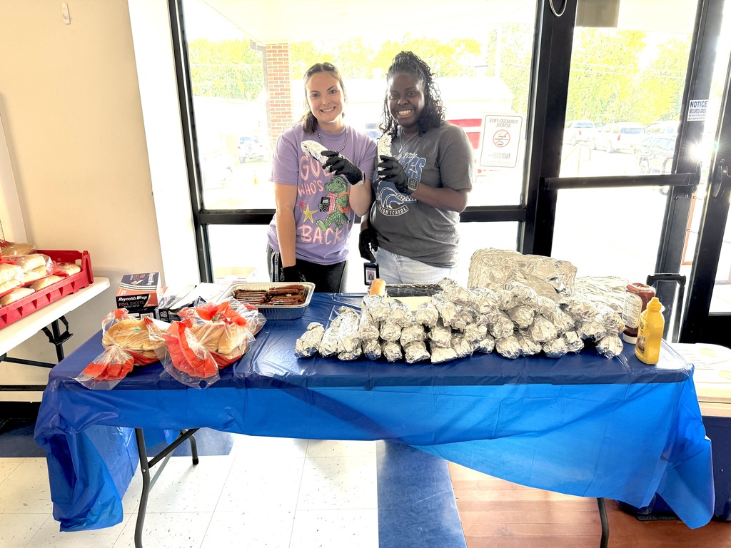 Cassidy Herron and Angel Fuller served hot dogs to our families.