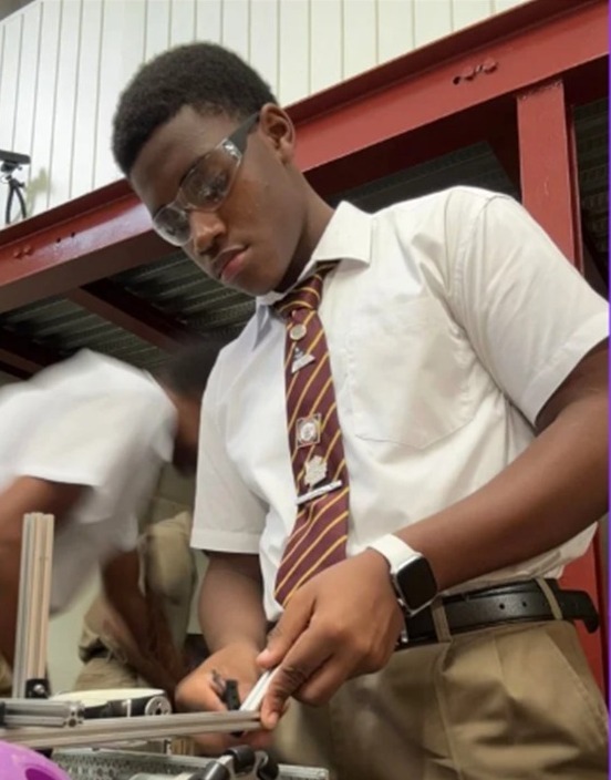 Image of Jordon building a robot.