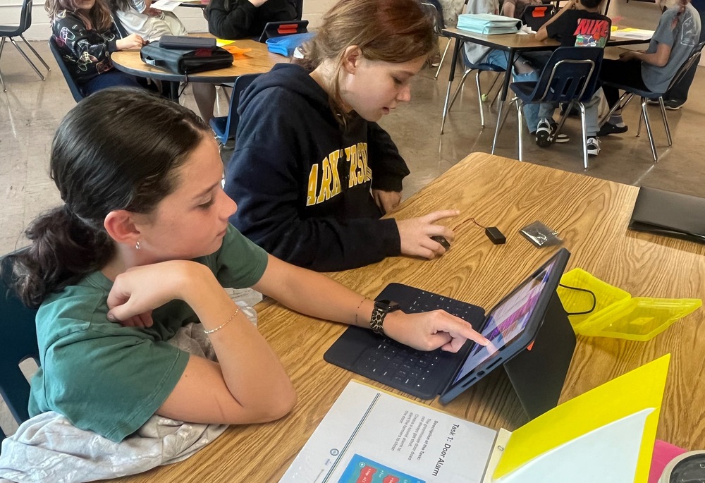 students working on iPad