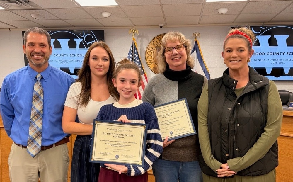 Lubeck staff receiving award