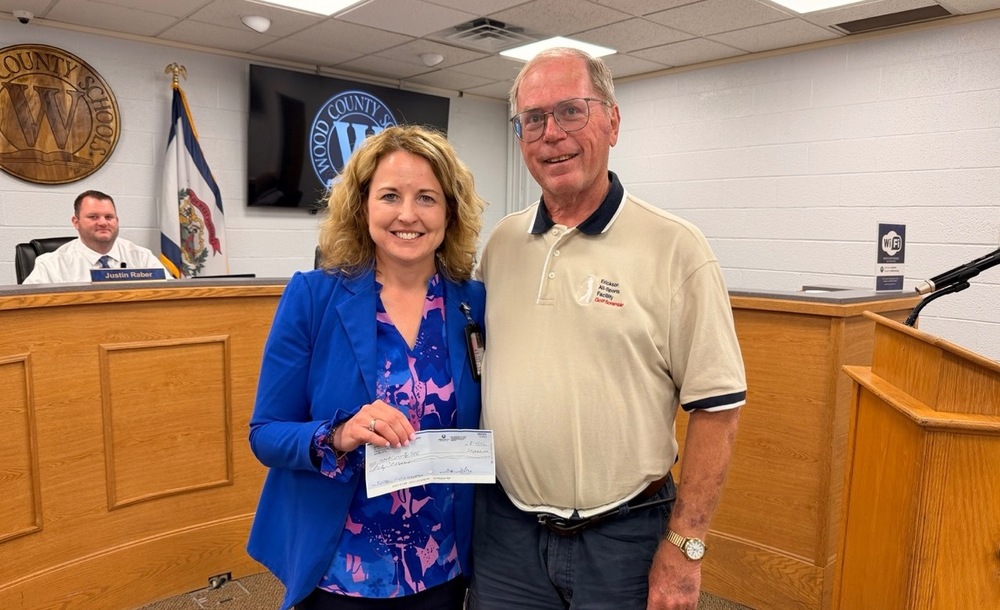 Presentation of check to superintendent