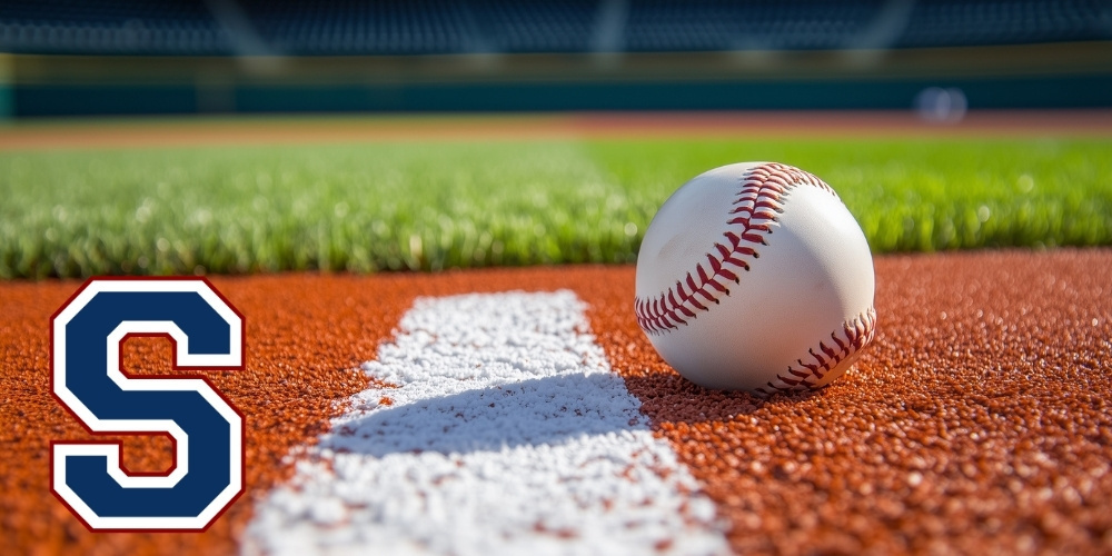 baseball laying on dirt on a field. image features the parkersburg south high school logo