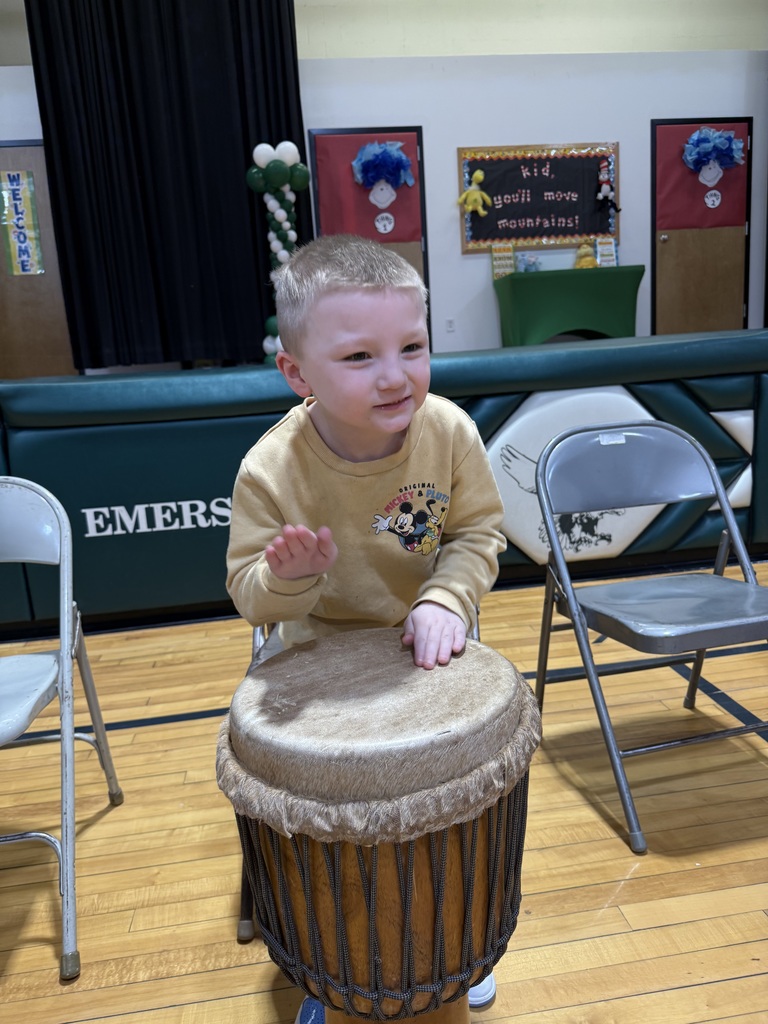 student playing the drums