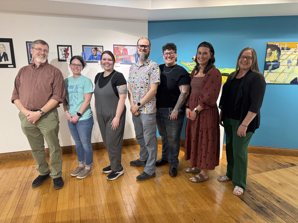 7 teachers pose for a photo