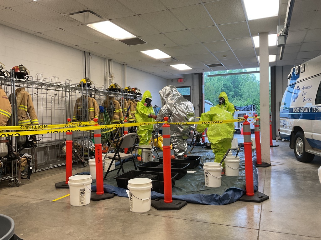Image of students in decontamination suites.