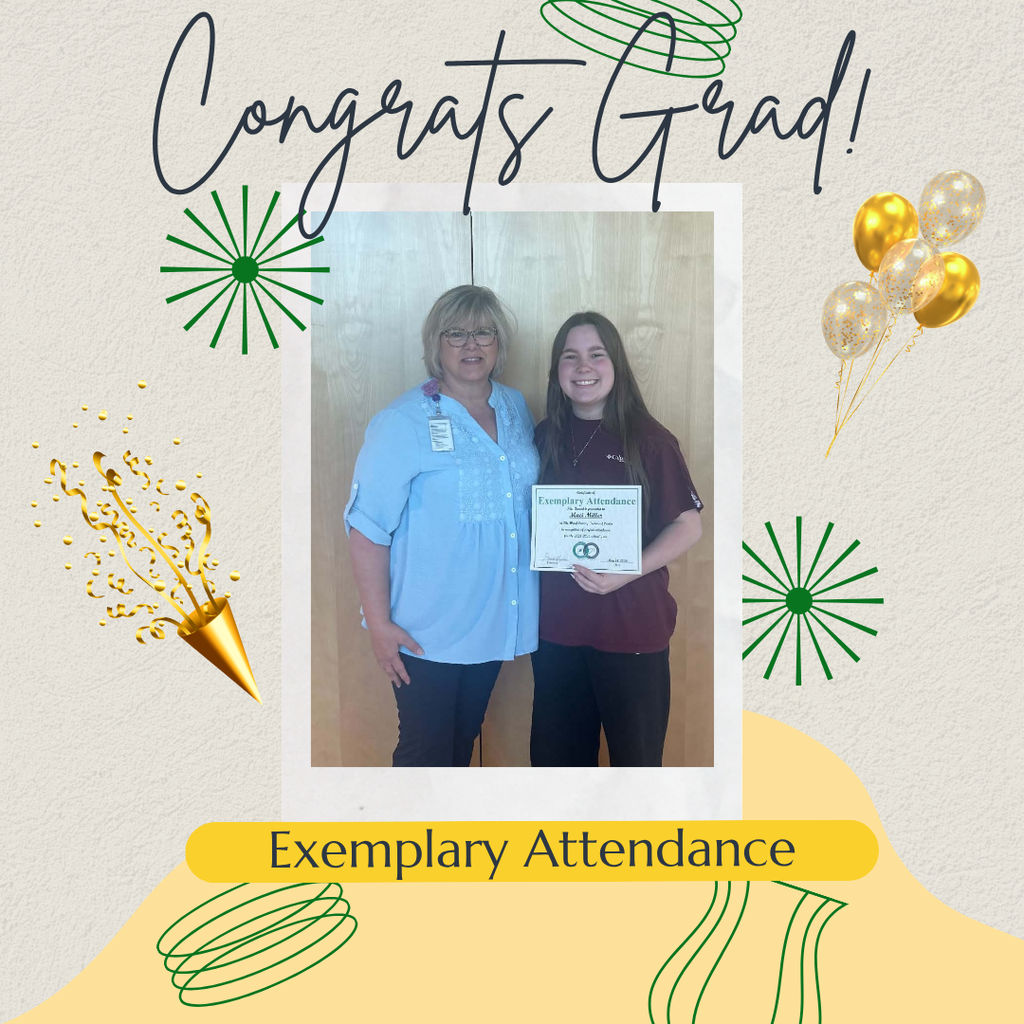 Image of student holding award with teacher.