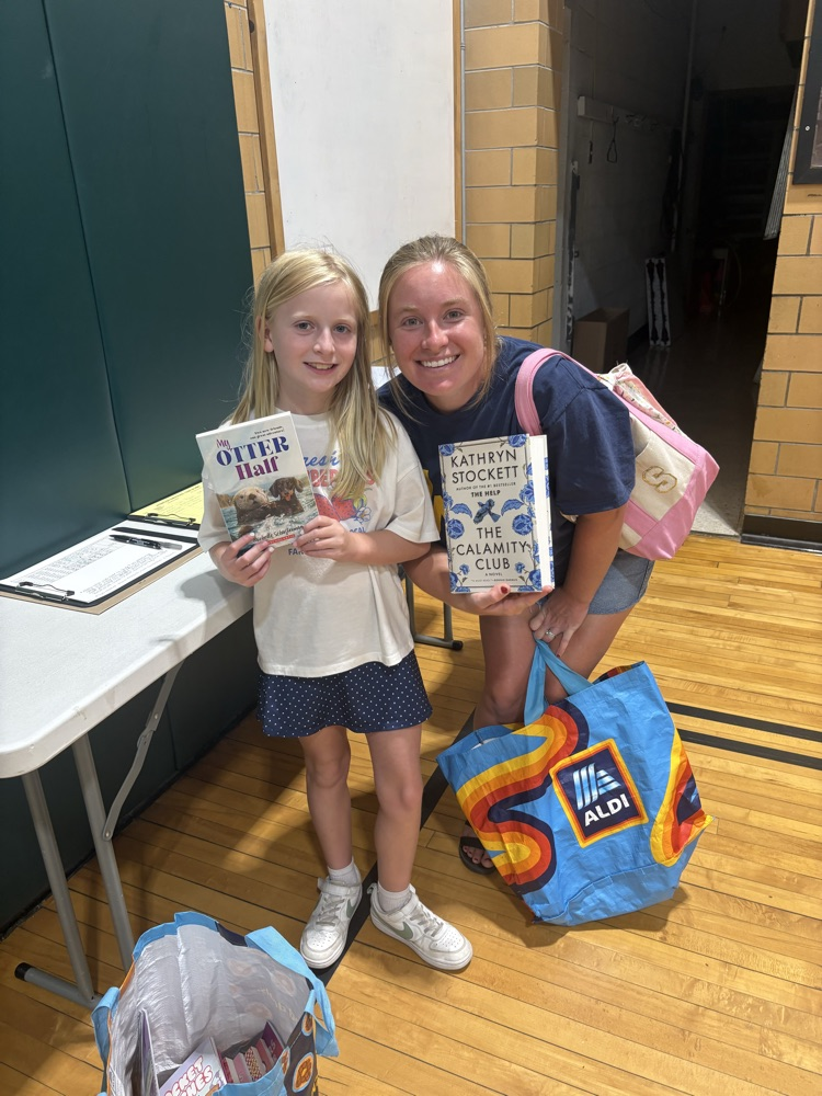 mom and daughter with books
