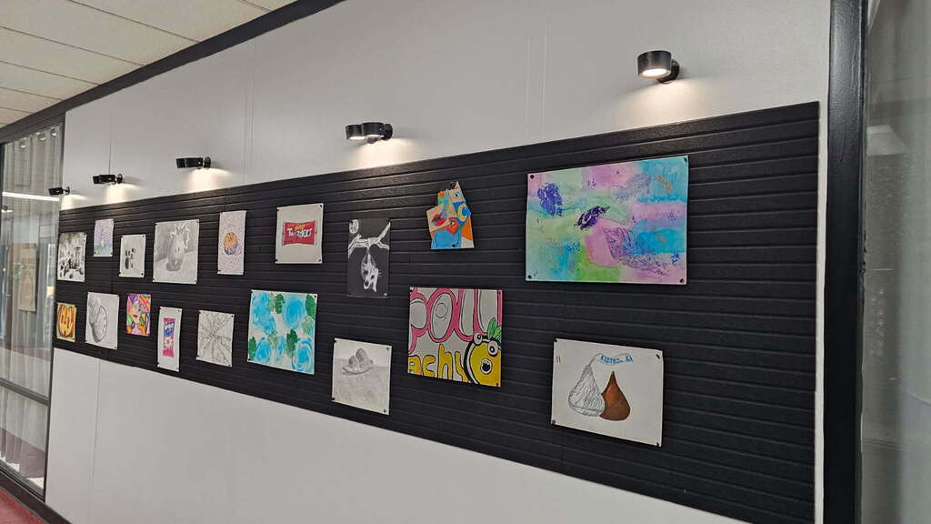 image of a wall of art at a school in Wood County Schools