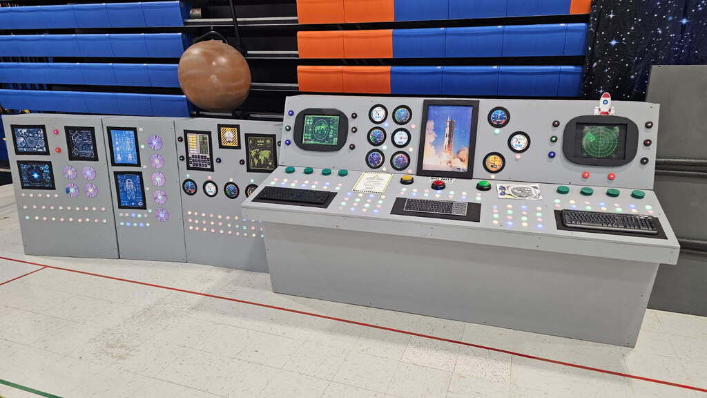image of a fake NASA command center set up in a Wood County Schools' gymnasium