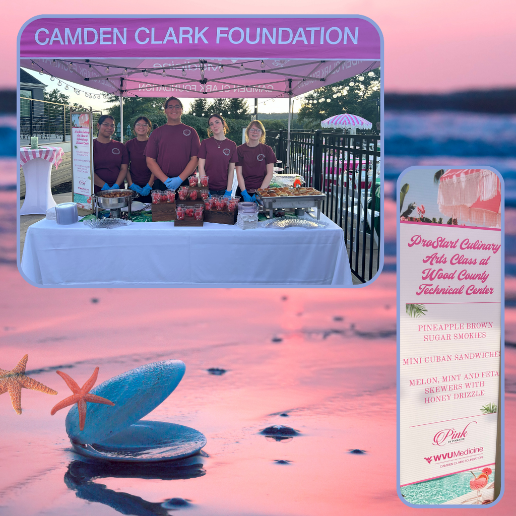 Five ProStart Culinary Arts students stand behind a food table at an outdoor event under a Camden Clark Foundation tent. The table displays several prepared foods and desserts. A menu on the right lists the dishes prepared by the Wood County Technical Center students.