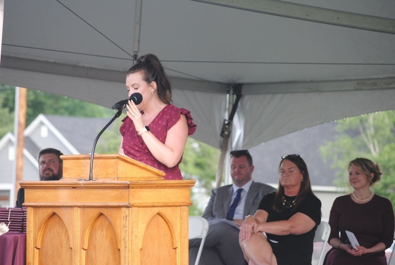 principal of high school giving a graduation speech