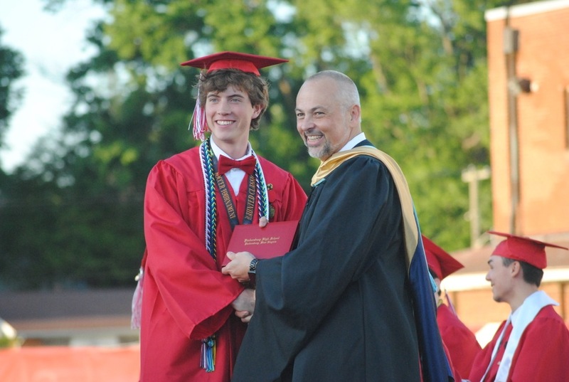 Graduate receiving diploma