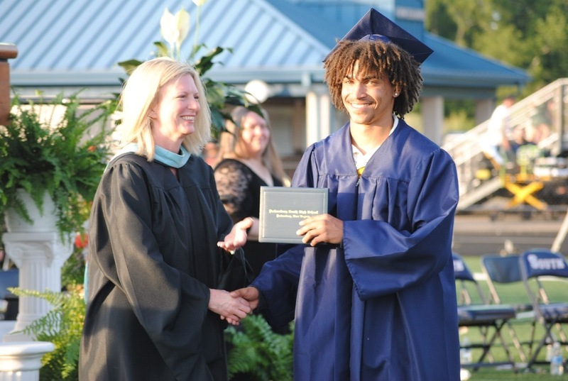 Student receiving diploma