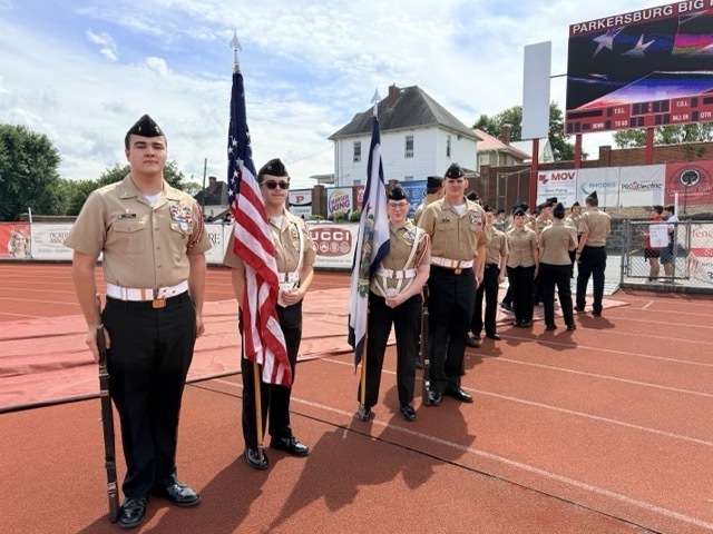 members of PHS NJROTC at ceremony on football field
