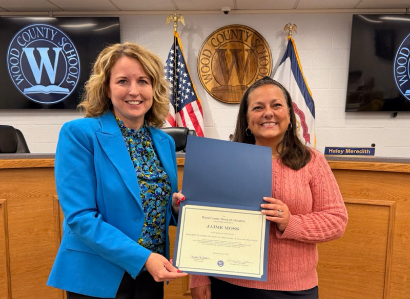 teacher receiving award
