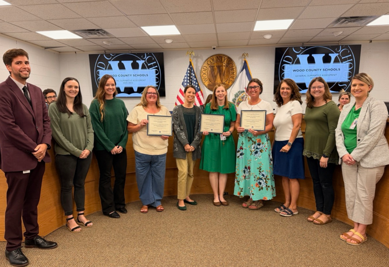 Criss staff receiving award