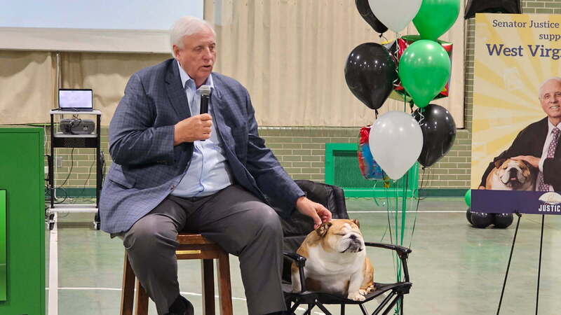 WV Senator Jim Justice and his pet dog