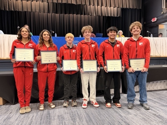 parkersburg high school members of the wrestling team receive certificates of recognition
