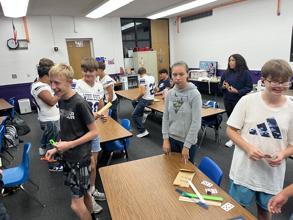 Students buying and selling in the marketplace.
