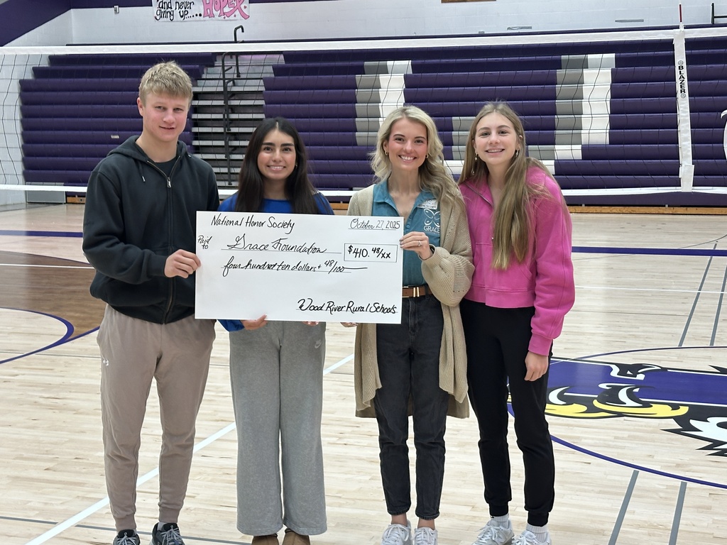 Madden, Marlen and Matilda present a check from NHS to Courtney from GRACE Foundation.