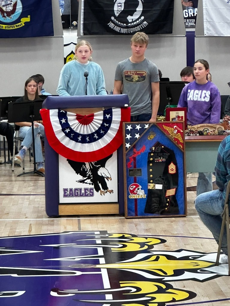 Students read names, branch and years of service for many Veterans while their picture was displayed.