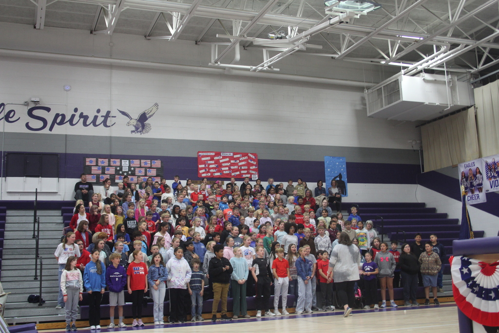 High school band and elementary choir performed some songs.