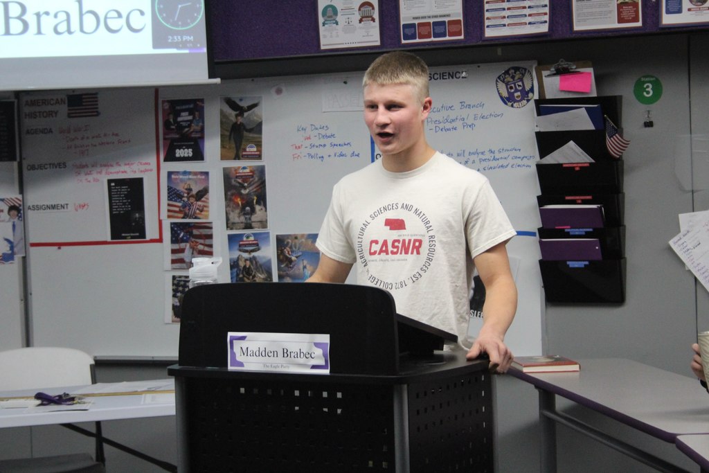 Madden at the podium