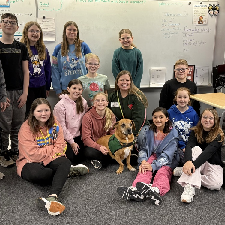 6th graders pose with Ralphie