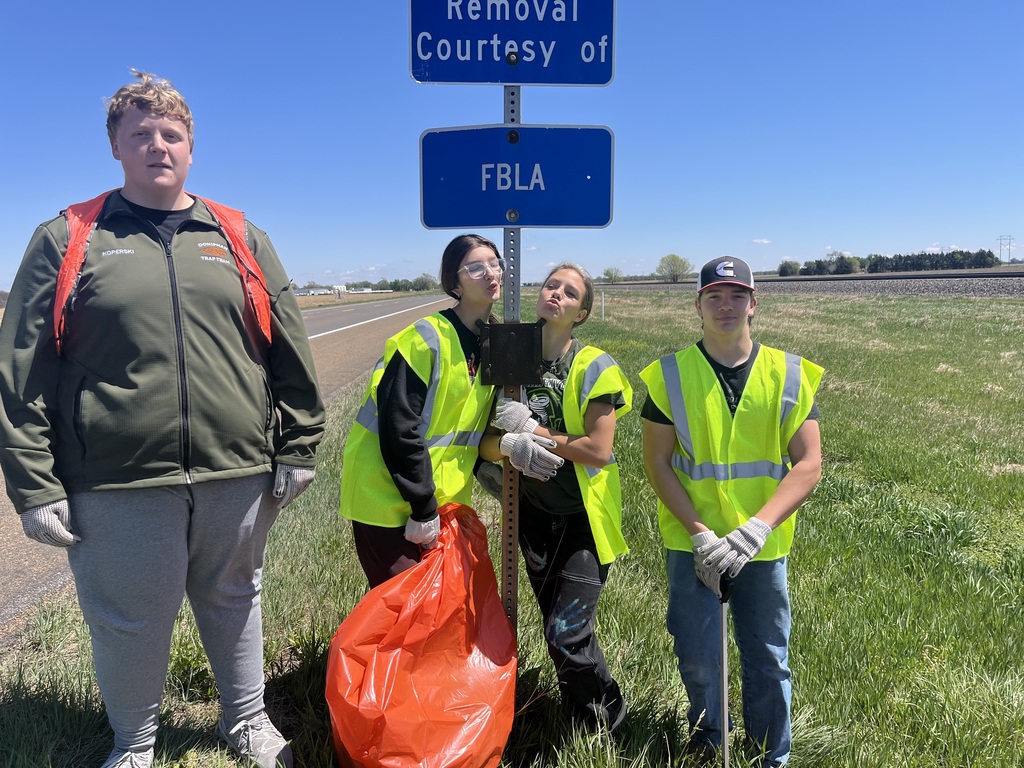Student picking up trash